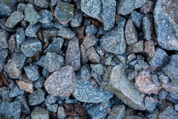 Granit çakıl doku. İnşaat malzemeleri. çakıl, ezilmiş taş, taş. gri granit çakıl arka plan karışım beton İnşaat endüstri için yukarıya kapatmak