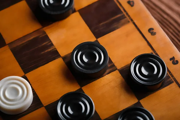 checkerboard with checkers. Game concept. Board game. Hobby. checkers on the playing field for a game.