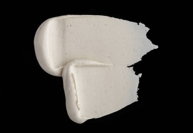 Yapısal Alçı beyaz siyah bir arka plan. Beyaz krema. boya karalama. Hamuru.