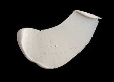 Yapısal Alçı beyaz siyah bir arka plan. Beyaz krema. boya karalama. Hamuru.