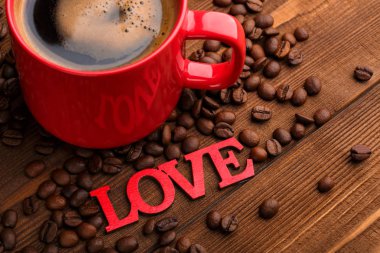 Kahve çekirdekleri. Günaydın. Kavrulmuş kahve çekirdekleri arka plan kapatın. Üst metin kopyalama yeri olan kahve çekirdekleri kazık. Kahve evi.