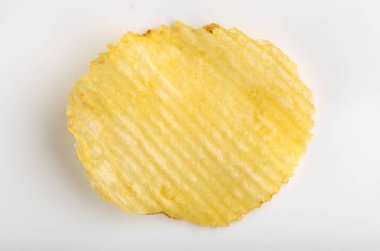 Gevrek patates cipsi. Fast Food. Patates. Yağlı sağlıksız gıdalar. Oluklu cips