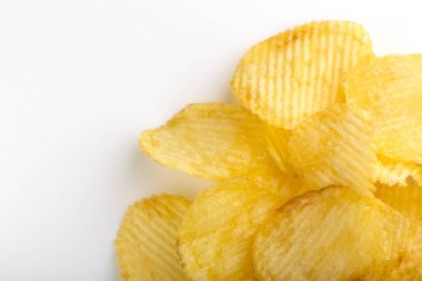 Gevrek patates cipsi. Fast Food. Patates. Yağlı sağlıksız gıdalar. Oluklu cips