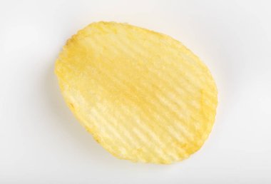 Gevrek patates cipsi. Fast Food. Patates. Yağlı sağlıksız gıdalar. Oluklu cips