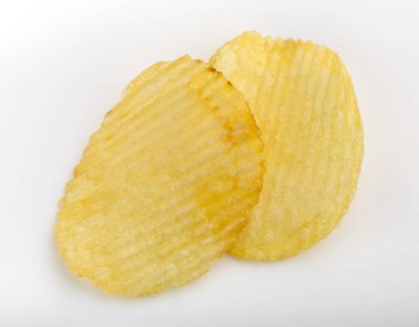 Gevrek patates cipsi. Fast Food. Patates. Yağlı sağlıksız gıdalar. Oluklu cips