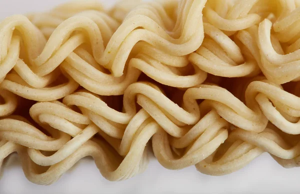 Noodles close up tasty fast food. Pasta. Fast food. Fast harmful food. — Stock Photo, Image