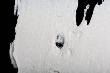 Yapısal Alçı beyaz siyah bir arka plan. Beyaz krema. boya karalama. Hamuru