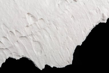 Yapısal Alçı beyaz siyah bir arka plan. Beyaz krema. boya karalama. Hamuru