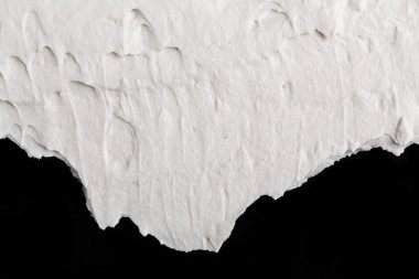 Yapısal Alçı beyaz siyah bir arka plan. Beyaz krema. boya karalama. Hamuru