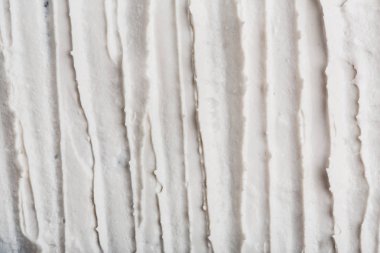 Yapısal Alçı beyaz siyah bir arka plan. Beyaz krema. boya karalama. Hamuru