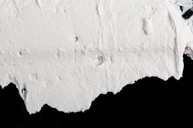 Yapısal Alçı beyaz siyah bir arka plan. Beyaz krema. boya karalama. Hamuru