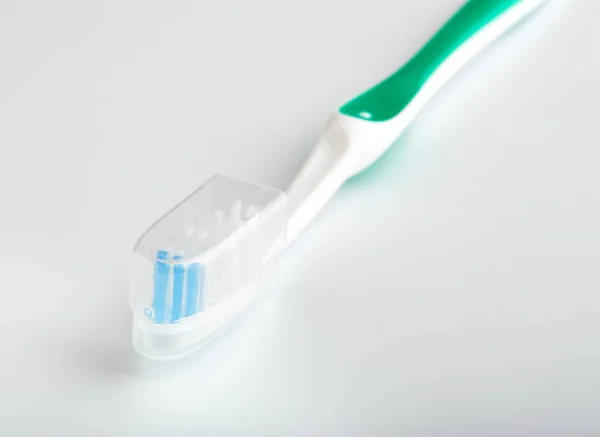 Toothbrush isolated on white. Personal hygiene. A healthy mouth. Bathroom amenities. accessories — Stock Photo, Image