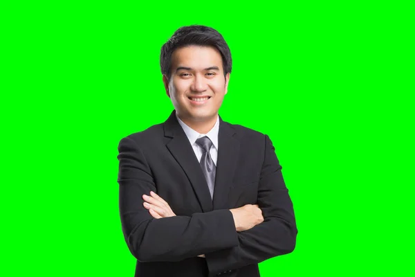 Joven asiático guapo hombre de negocios en negro traje sonriendo aislado —  Fotos de Stock