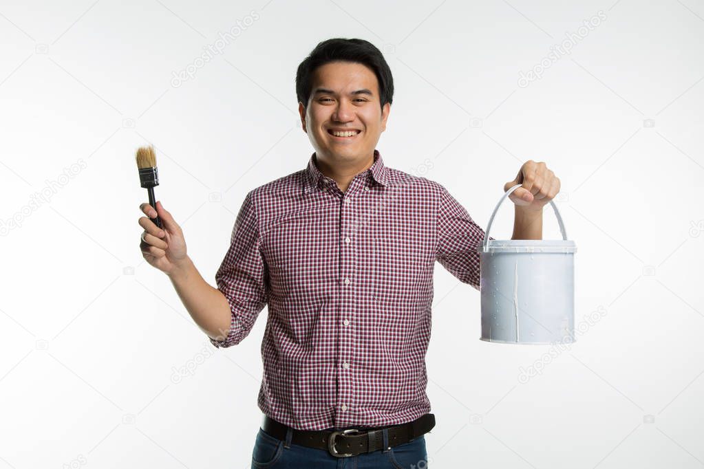 Portrait of young asian handsome smiling painter