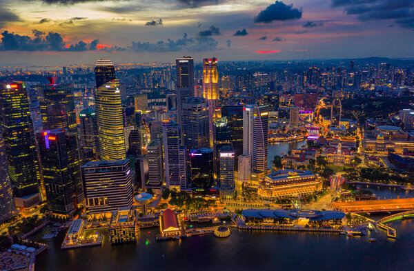 Aerial view of the Singapore landmark financial business district at sunset scene with skyscraper and beautiful sky. Singapore downtown