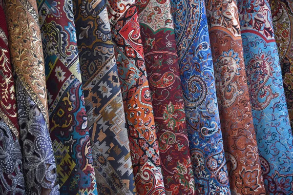 Fabrics with traditional Persian patterns.  Grand Bazaar, Naqsh-e Jahan Square, Isfahan, Iran