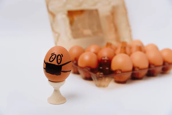 chicken egg with medical mask , Easter egg on white background 1