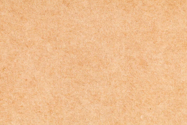 Sheet of paper brown cardboard. Texture closeup, natural rough textured paper background. — Stock Photo, Image