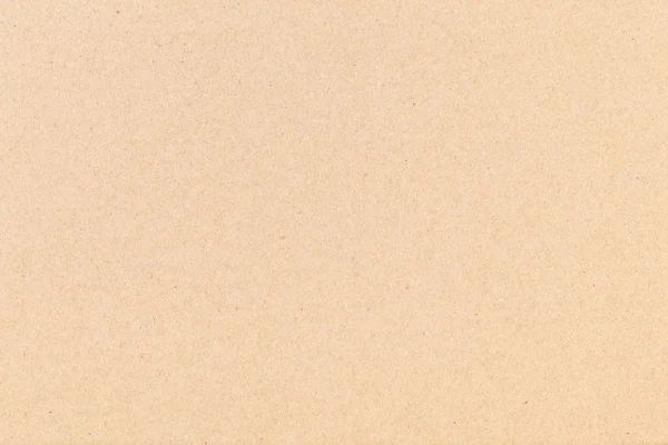 Folha de papel cartão marrom. Textura close-up, fundo de papel texturizado áspero natural . — Fotografia de Stock