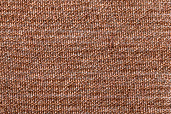 Dark brawn fabric background texture. Detail of textile material close-up