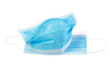 Beyaz arka planda tıbbi koruyucu maske. Corona virüsü. Sağlık ve tıbbi konsept. Tıbbi grip hastalığına yakından bakın koruyucu yüz maskesi tekstil filtresi