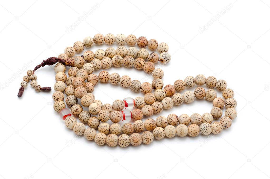 Buddhist or Hindu prayer beads isolated on white. Stock Photo by