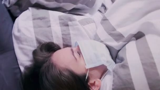 Top View Young Woman Medical Mask Lying Bed Fever Coughing — Stock Video