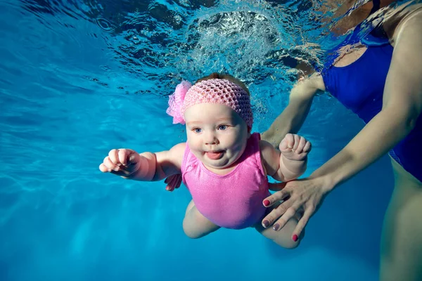 Little Infant Girl Swims Underwater Pool Open Eyes Pink Dress — Stock Photo, Image