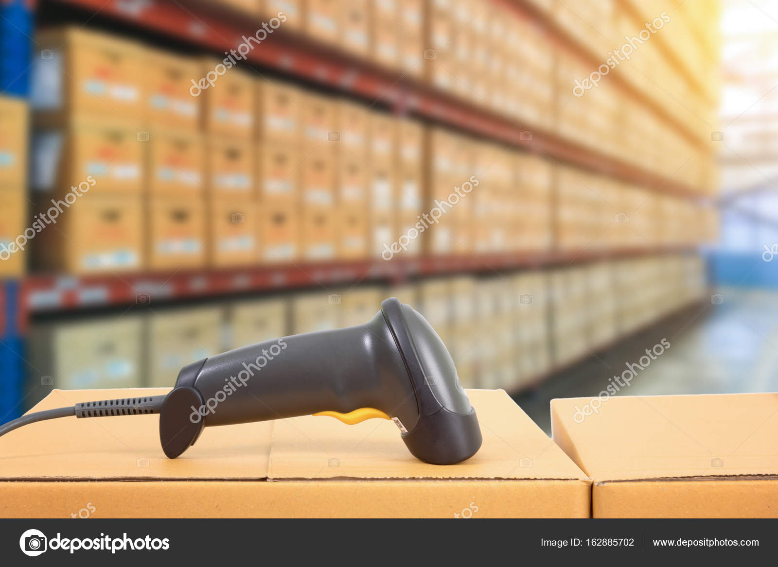 Barcode scanner in warehouse Stock Photo by ©Aunging 162885702