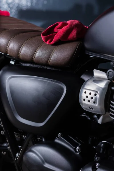 Motorcycles detailing series: Red cloth on vintage motorcycle seat — Stock Photo, Image