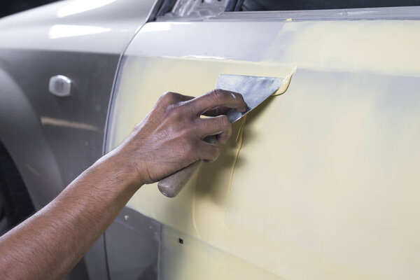 Auto body repair series: Working on putty