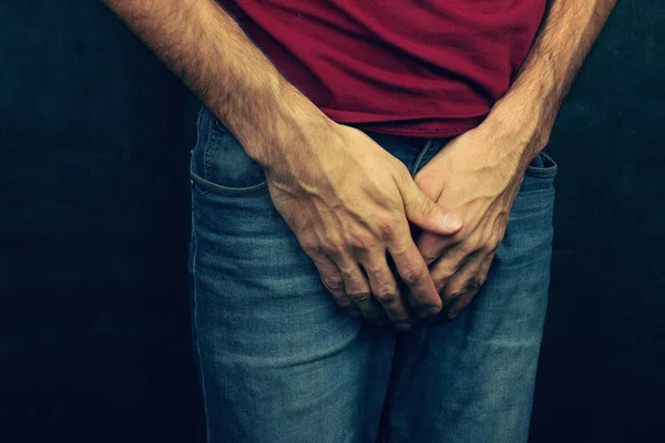 Man having a problem with his penis — Stock Image Man having a problem with his penis Royalty Free Stock Images