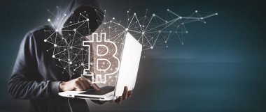 Bilgisayar ve dizüstü bilgisayar kullanan bilgisayar korsanı Bitcoin
