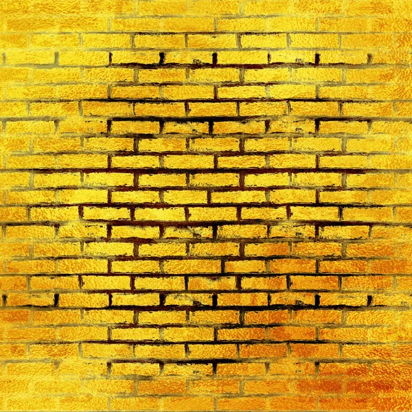 Gold Ziegelwand Textur oder Hintergrund. eine Wand aus goldglänzenden Blöcken — Stockfoto