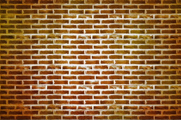 Gold brick wall texture or background. A wall of shiny gold blocks — Stock Photo, Image