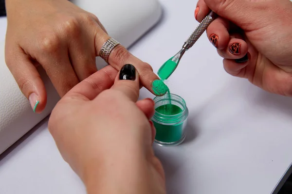 Close Up of Women Hands with Painted Nails and Coordinating Mineral Eye Shadows Swatches in Festive Colors on Black Background — Stock Photo, Image