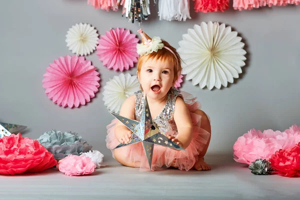 Cute one year old girl wearing beautiful dress. Kids fashion. Happy childhood. Studio shot. — Stock Photo, Image
