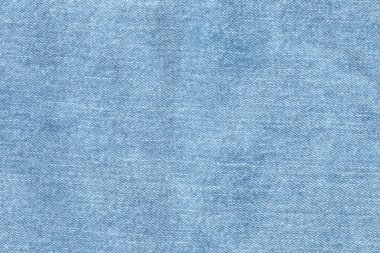 Mavi kot kumaş. Kot pantolon deseni ya da kot pantolon arkaplanı. Moda tasarımı için kot pantolon