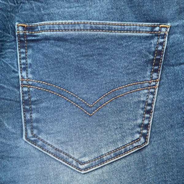 Blue Jeans Tasche oder Jeanstasche Hintergrund. dunkelblaue Jeanstasche oder Jeanstasche Hintergrund für Bekleidungsdesign. — Stockfoto