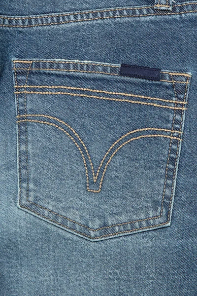 ブルージーンズポケットまたはデニムポケットの背景。ダークブルージーンズポケットまたはデニムポケットの背景用アパレルデザイン. — ストック写真