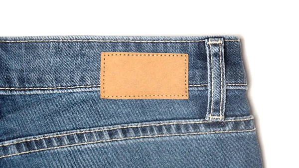 Štítek cenovka maketa na modré džíny z recyklovaného papíru. — Stock fotografie
