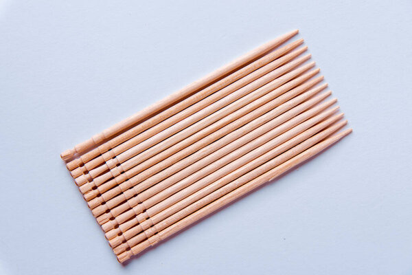 original wooden toothpick on white background. Place for sapce