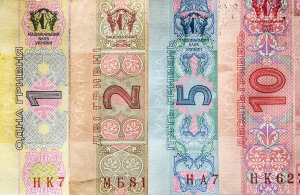 Los valores de los billetes en la muestra en 2011 el Banco Nacional de Ucrania denominación uno, dos, cinco y diez hryvnia — Foto de Stock