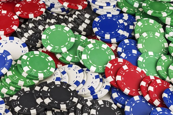 Different colors of casino chips fill the entire space frame