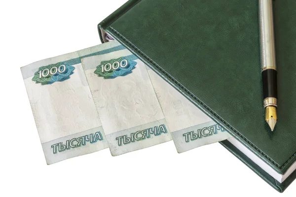 Dagbok, reservoarpenna och ryska rubel på ljus bakgrund — Stockfoto