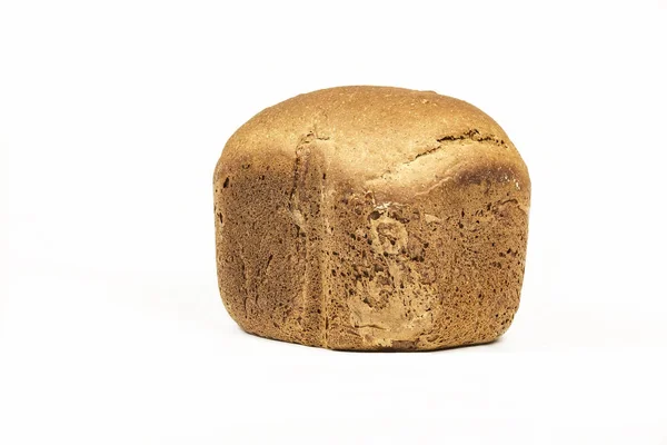 Em um fundo branco um pão de pão branco — Fotografia de Stock