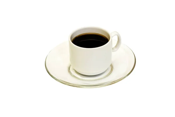 A cup of black coffee on a transparent saucer on a white backgro — Stock Photo, Image