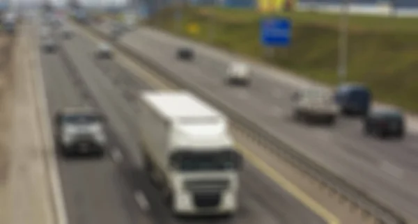 Thematic blurred background of automobile traffic on the highway — Stock Photo, Image