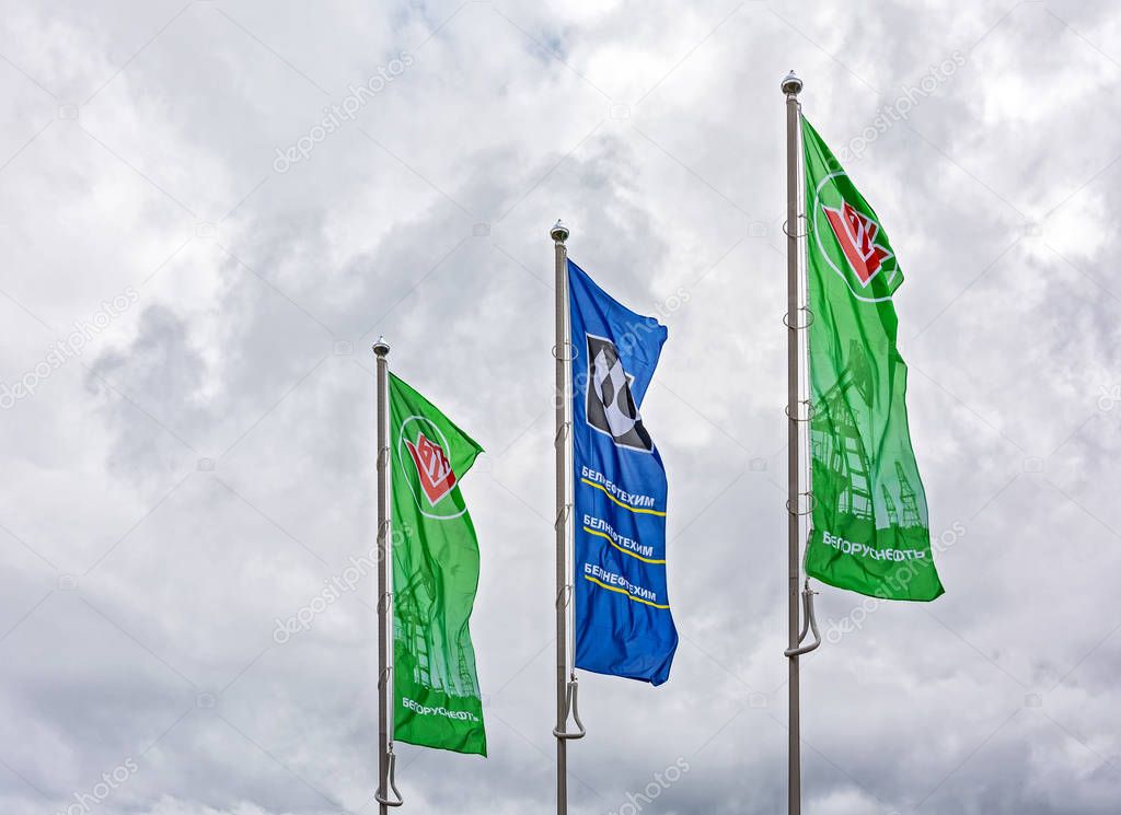 Belarus, Minsk-September 24, 2016: Advertising flags of the Belarusian state concern for oil and chemistry. The green flags bear the inscription 