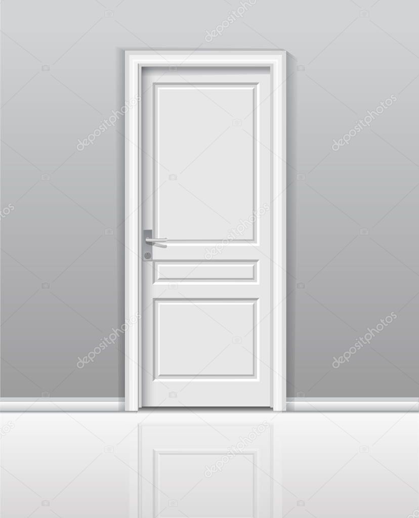 Closed white door in a white room